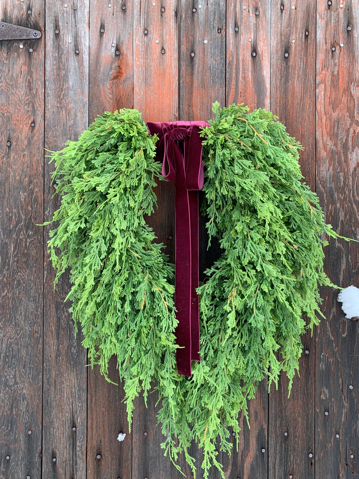 Soft Touch Cascading Cedar Winter Wreath